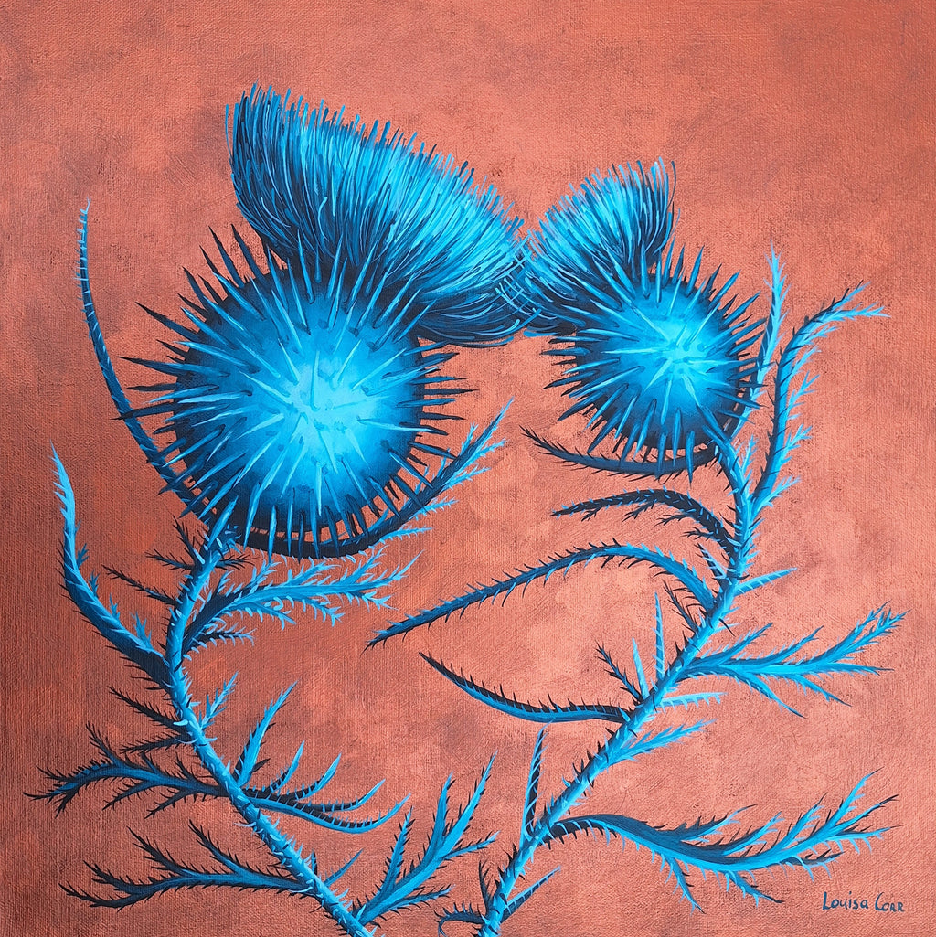 Blue thistle flowers on a textured brown background